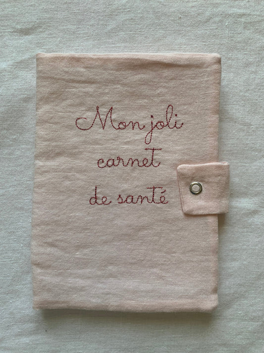 Protège carnet de santé lin rose pâle broderie rose "mon joli carnet de santé"