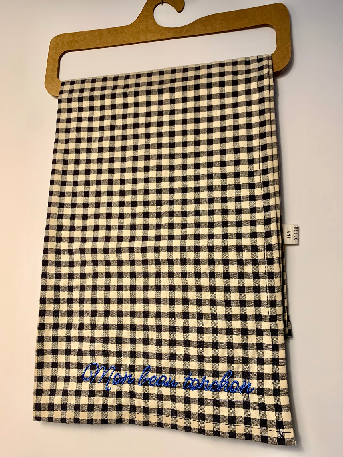 Torchon petits carreaux noirs et écru broderie bleu petrole